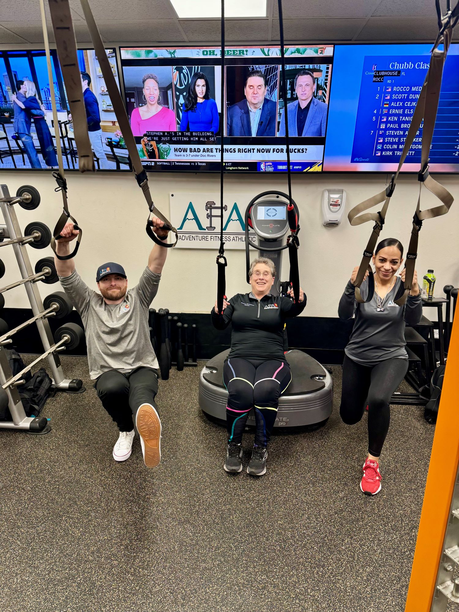 Personal trainers Chris, Susan, and April at AFAC gym in Thornton, CO