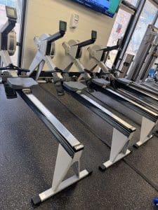A group of four rowing machines at AFAC gym