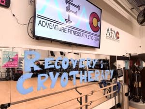 Photo of a mirror at AFAC gym with the words "Recovery; Cryotherapy" written on it in thick light blue lettering
