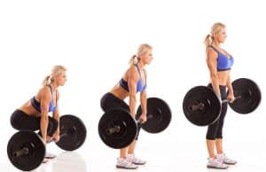 Woman shown at three stages of a deadlift, lifting the barbell from the floor to her knees to her hips